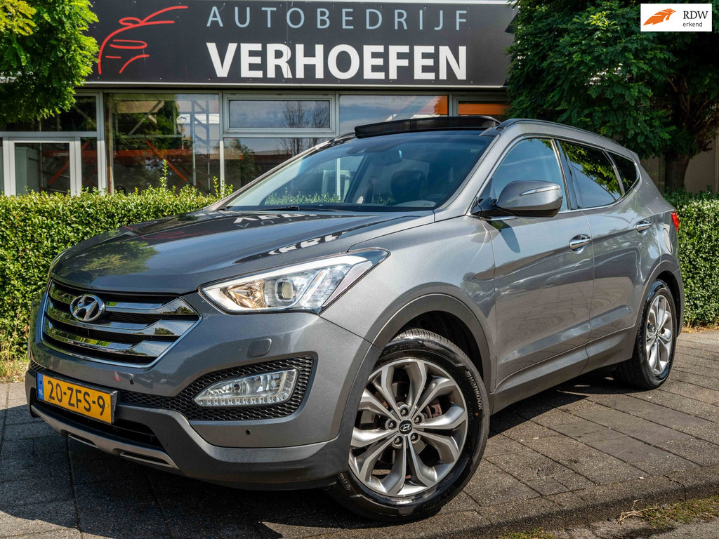 Hyundai Santa Fe 2.4i GDI 4WD i-Catcher 7p. - AUTOMAAT - PANORAMADAK - PARK CAMERA - STOEL VERW - LEDER ZWART ! 56230781-0.jpg | Autobedrijf Verhoefen